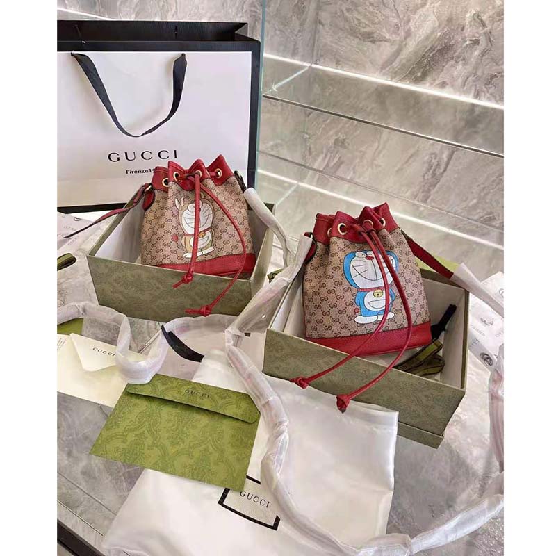 G*u*i women doraemon x G*u*i small bucket bag beigeebony mini gg supreme canvas