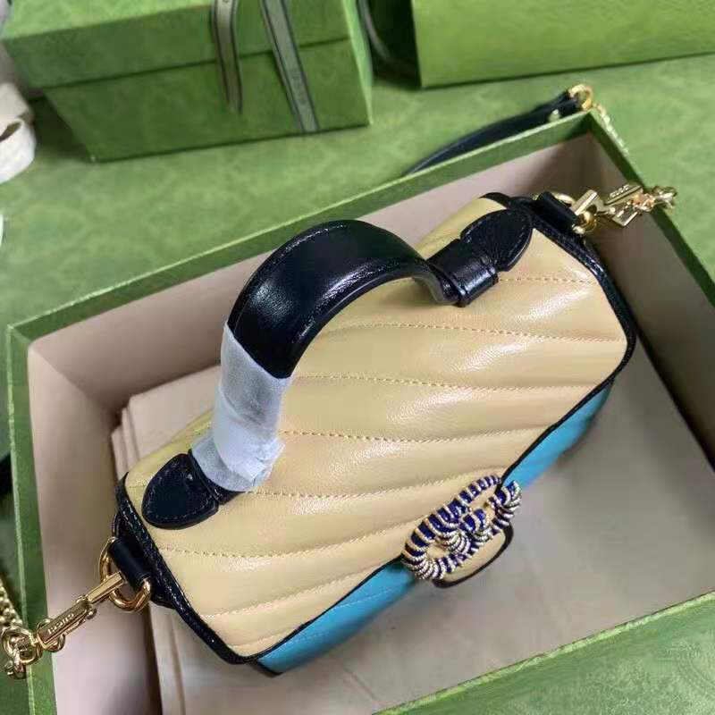G*u*i gg women online exclusive gg marmont mini bag pastel blue butter diagonal matelassé leather