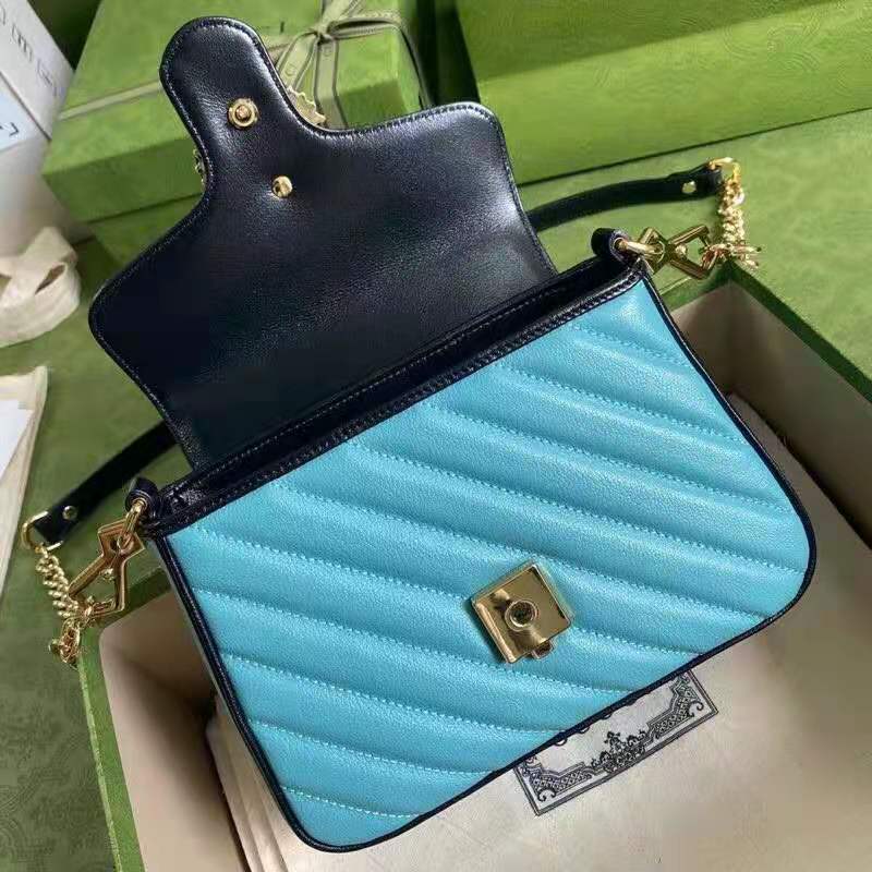 G*u*i gg women online exclusive gg marmont mini bag pastel blue butter diagonal matelassé leather