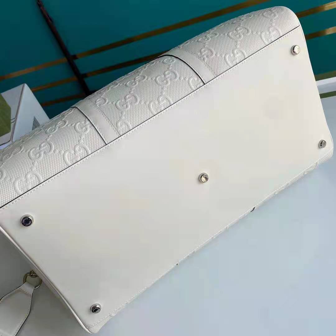 G*u*i gg unisex gg embossed duffle bag white gg embossed leather