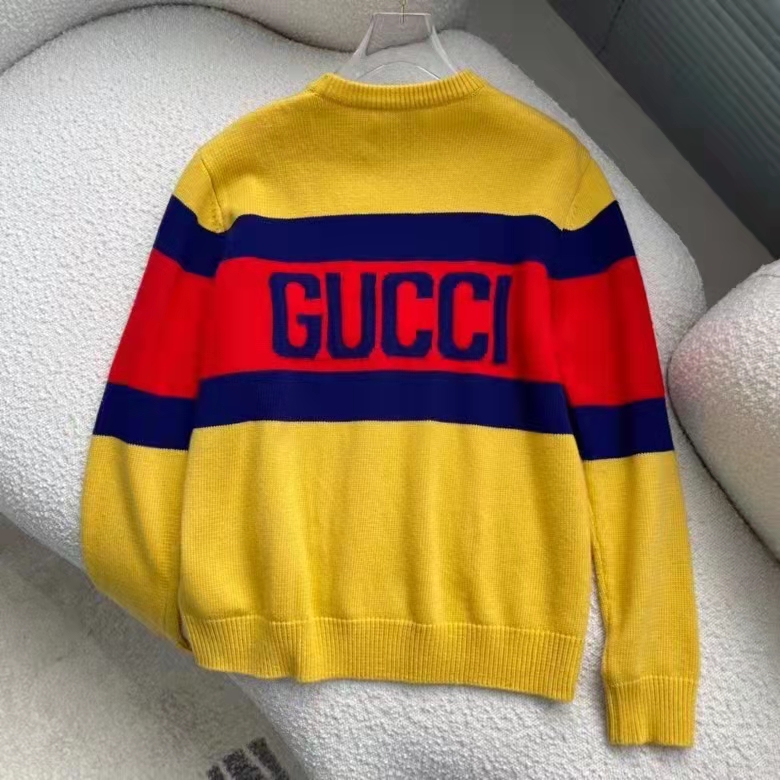 G*u*i women G*u*i 100 wool sweater yellow wool blue red web 100 intarsia