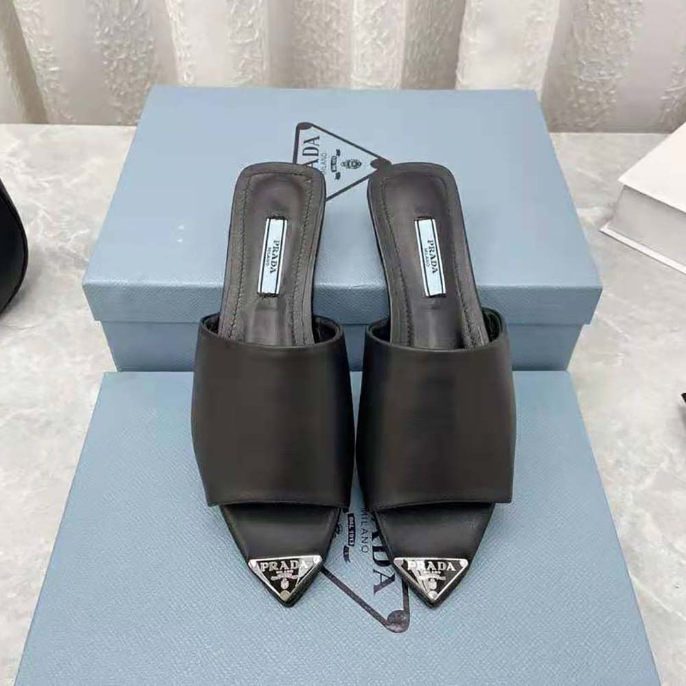Prada Women Brushed Leather Slides with a Modernist Line Feature an Unexpected
