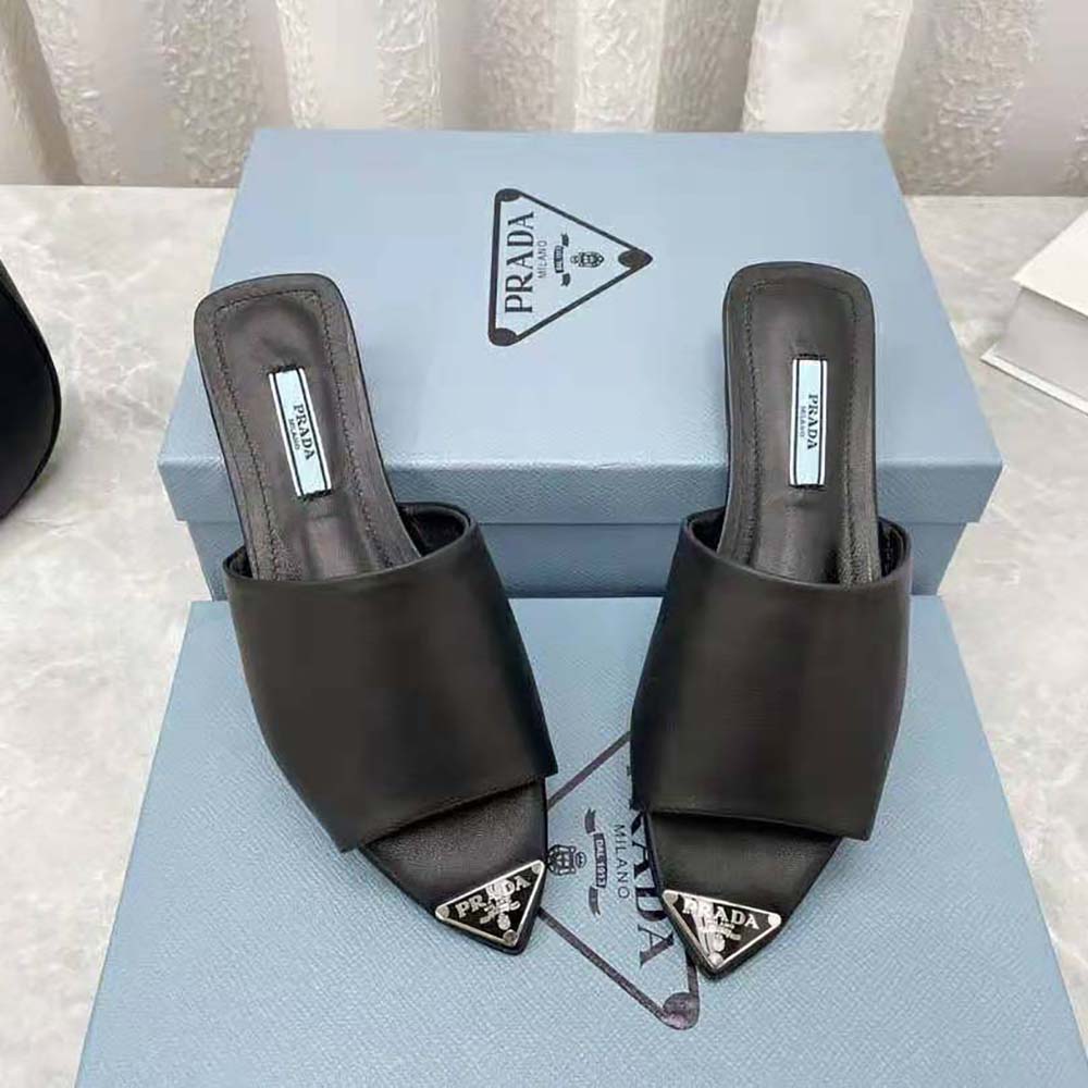 Prada Women Brushed Leather Slides with a Modernist Line Feature an Unexpected