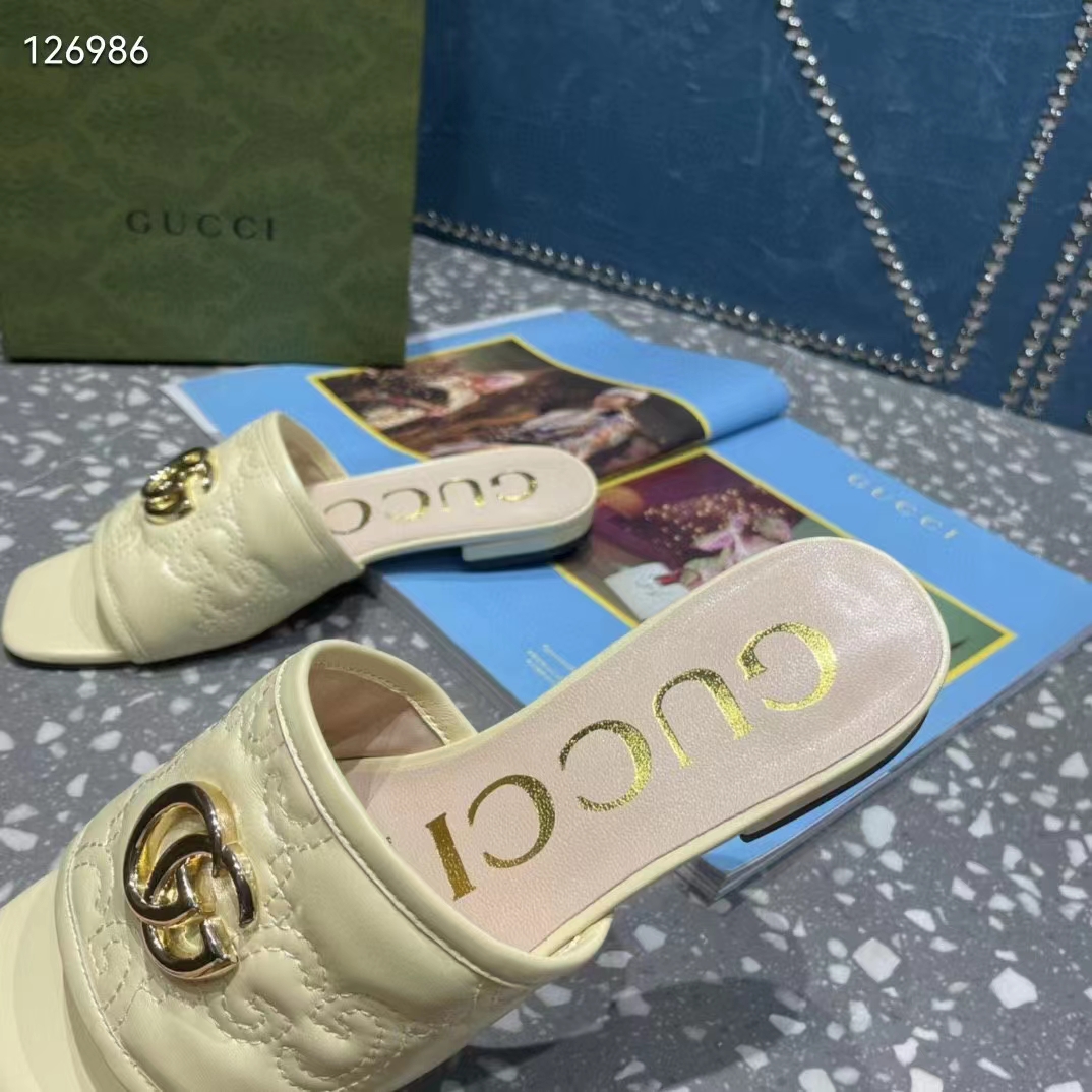 G*u*i women matelassé slide sandal beige gg matelassé leather square toe flat