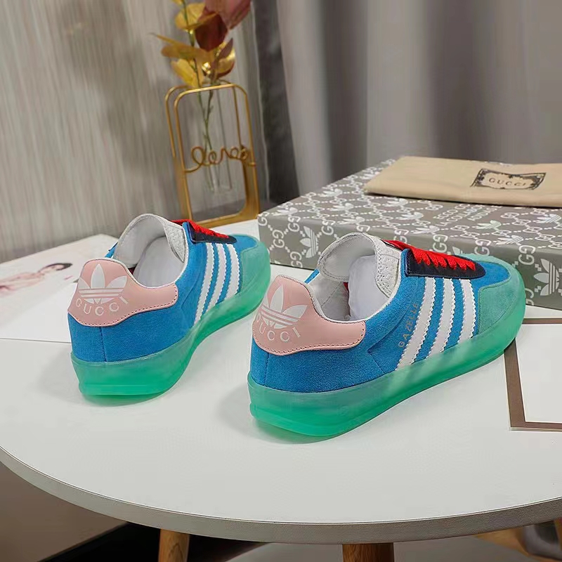 G*u*i unisex gg adidas x G*u*i gazelle sneaker light blue silk duchesse demetra