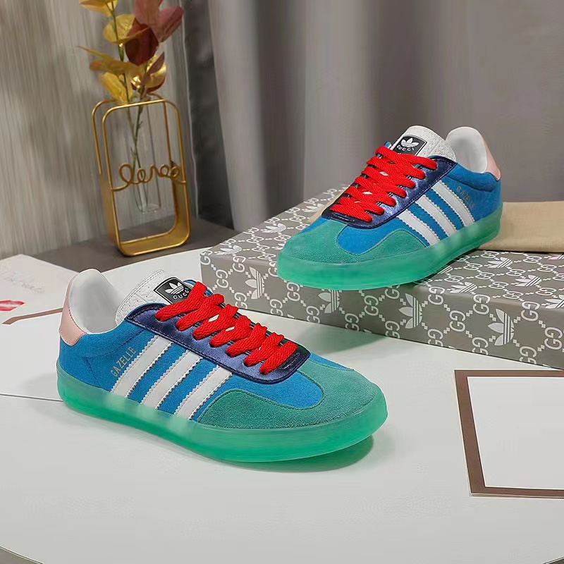 G*u*i unisex gg adidas x G*u*i gazelle sneaker light blue silk duchesse demetra
