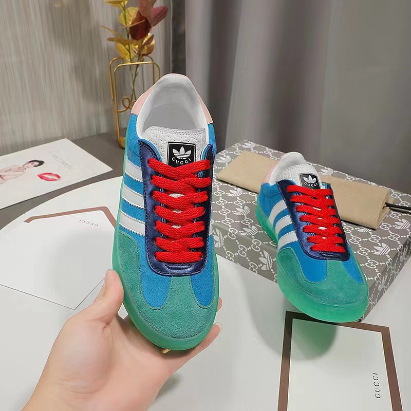 G*u*i unisex gg adidas x G*u*i gazelle sneaker light blue silk duchesse demetra