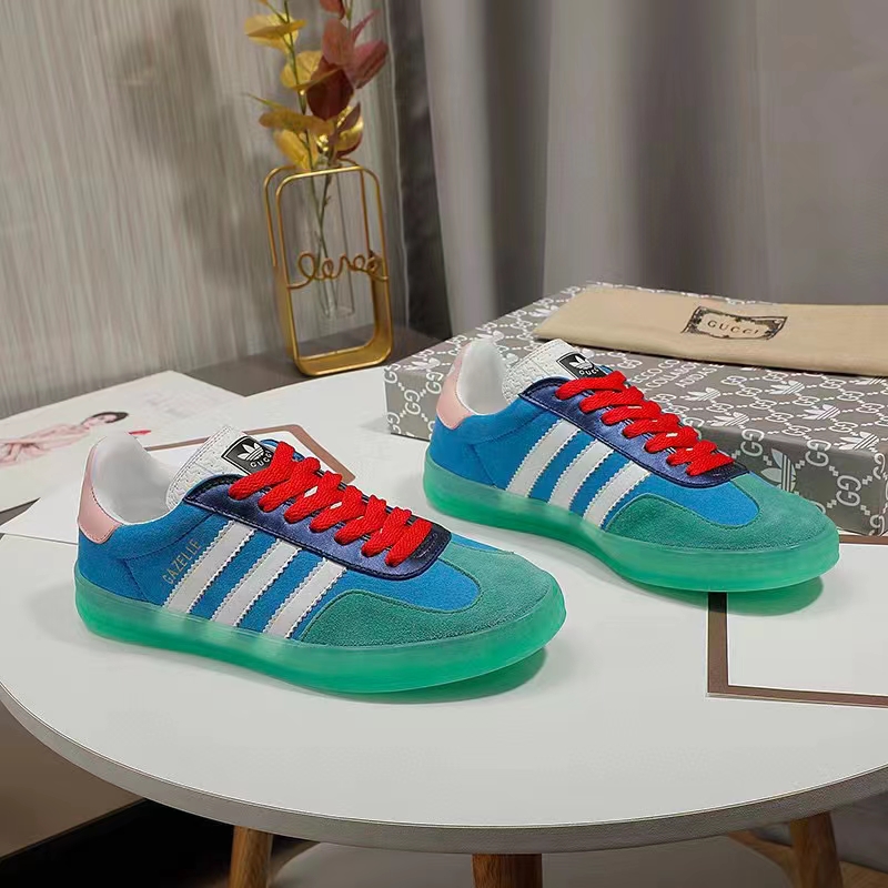 G*u*i unisex gg adidas x G*u*i gazelle sneaker light blue silk duchesse demetra