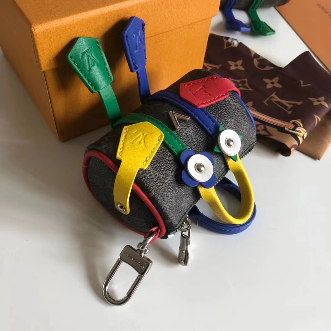 Louis Vuitton Unisex LV Mister Keepall Key Holder Bag Charm Monogram Eclipse Coated Canvas Leather