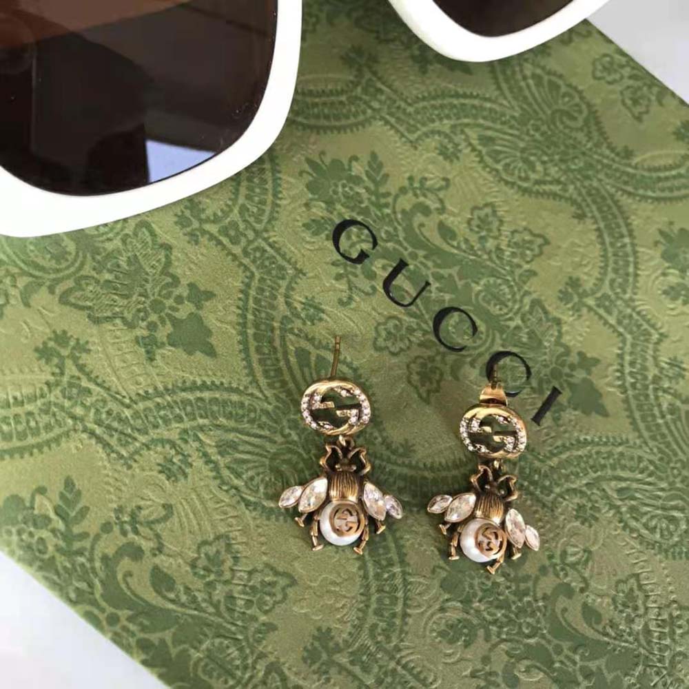 G*u*i women bee earrings with interlocking g