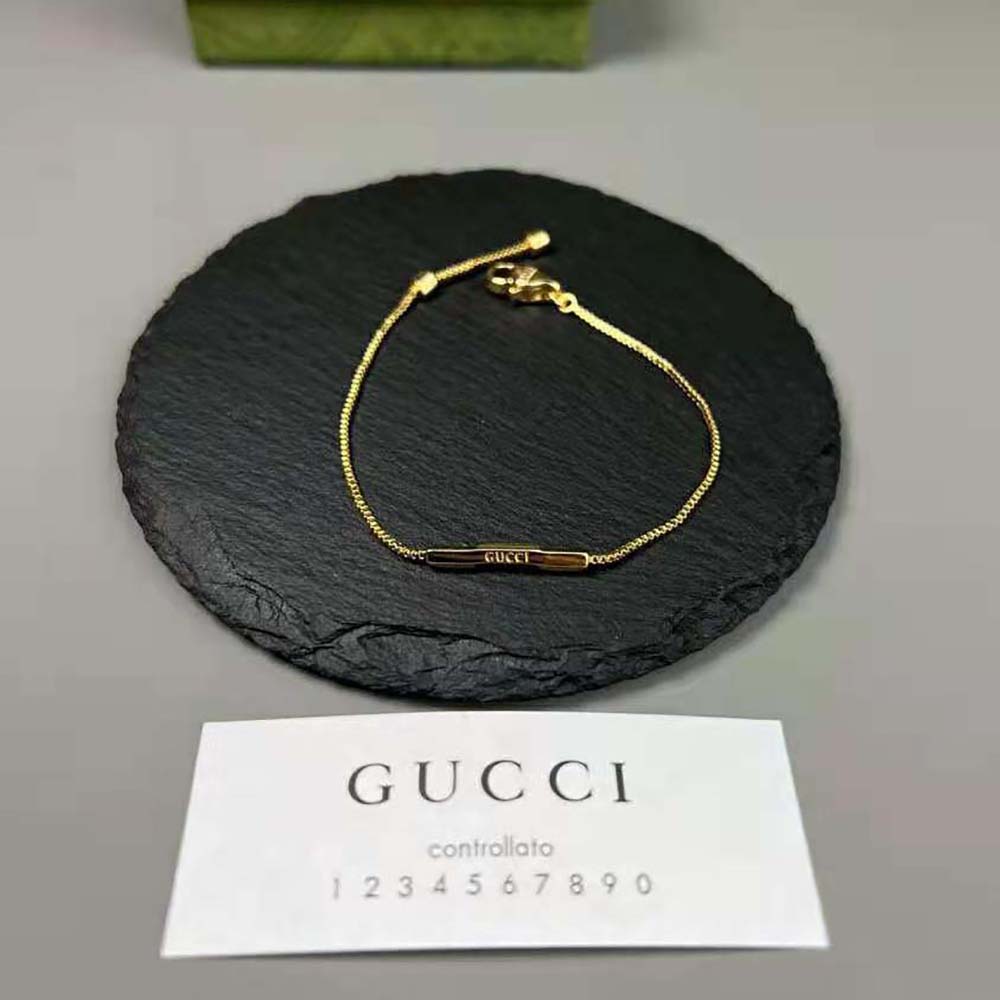 G*u*i women link to love bracelet with ‘G*u*i’ bar in yellow gold