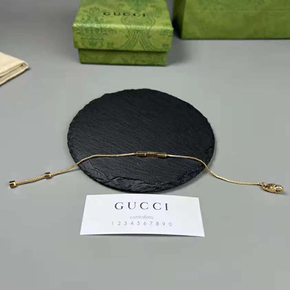G*u*i women link to love bracelet with ‘G*u*i’ bar in yellow gold