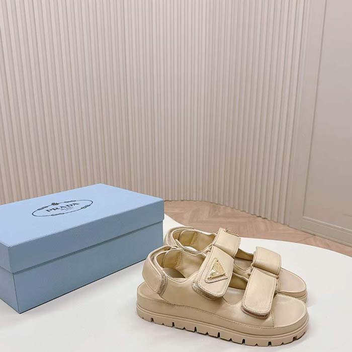 Prada Women Patent Leather Sandals Beige Metal Lettering Logo Lug Tread
